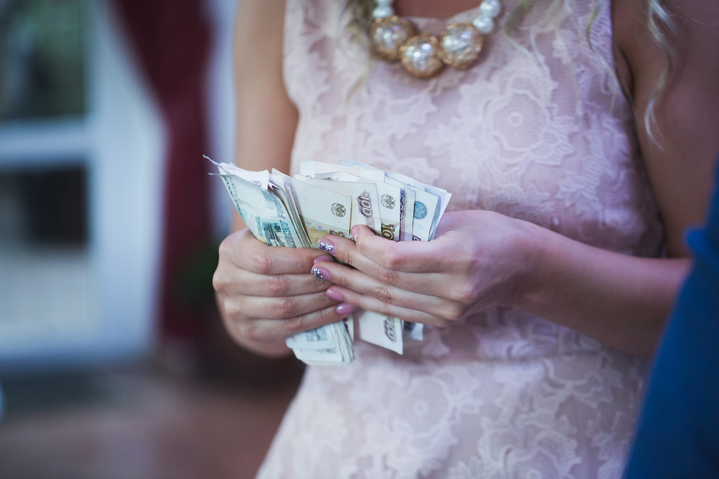 The couple the bride and bridegroom count money at the wedding.The couple the bride and bridegroom count money at the wedding.